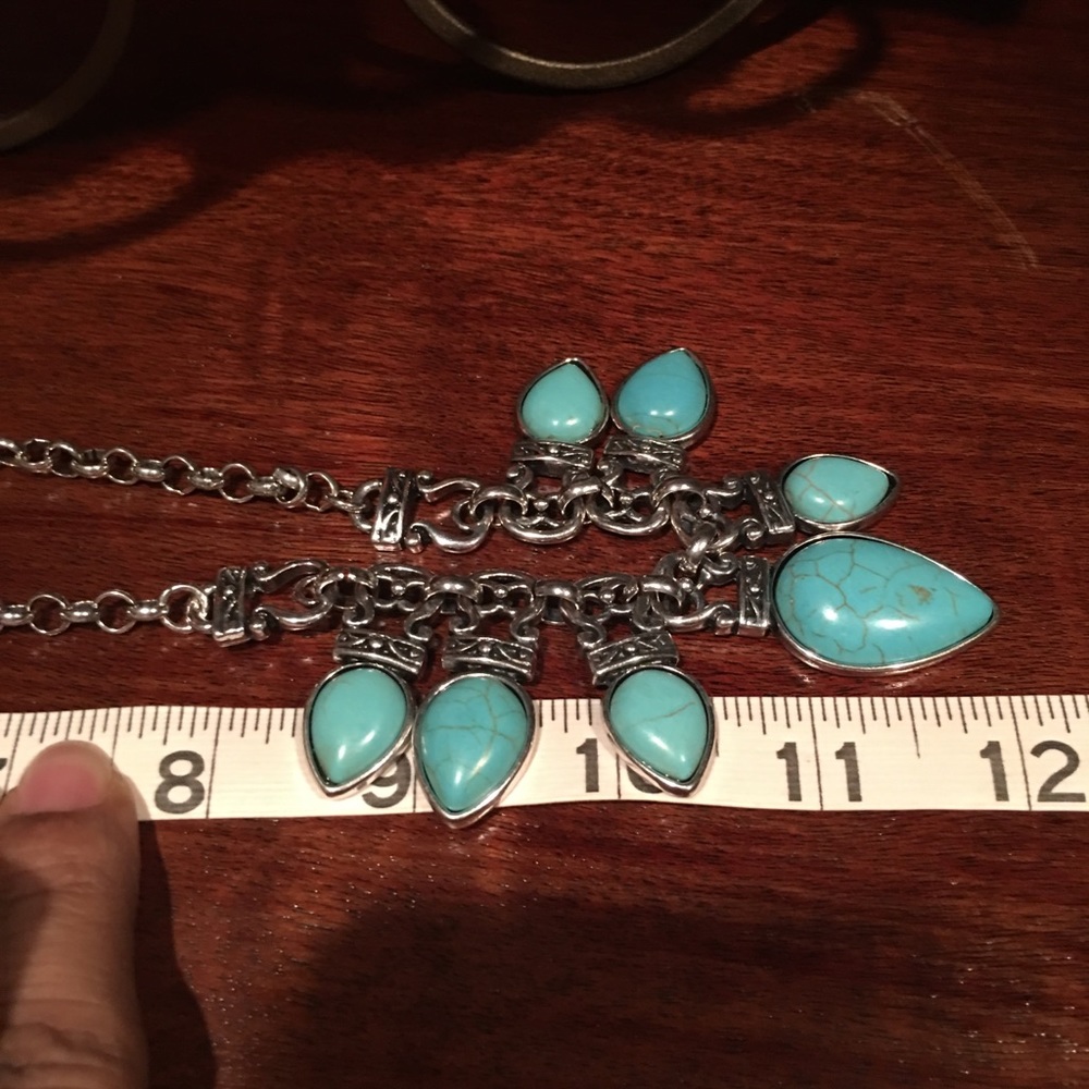 Two piece necklace with ear rings.